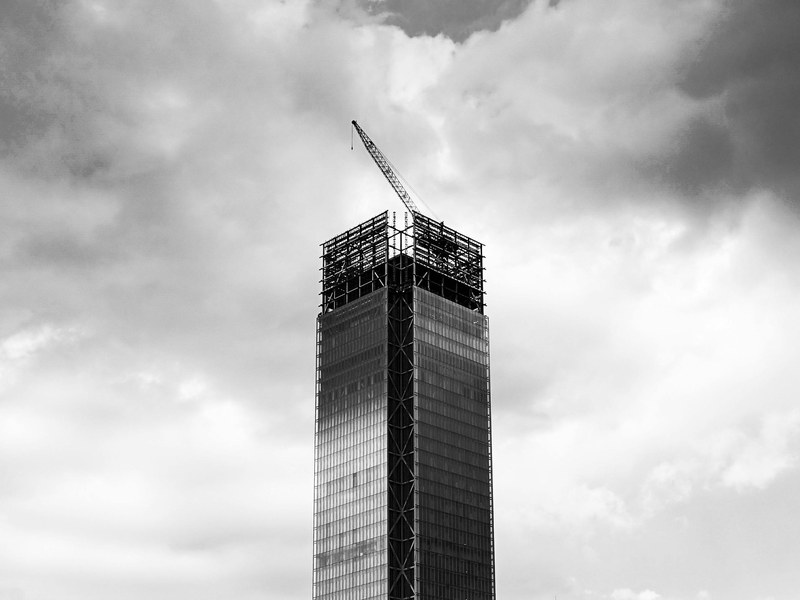 High-rise building under construction against the sky
